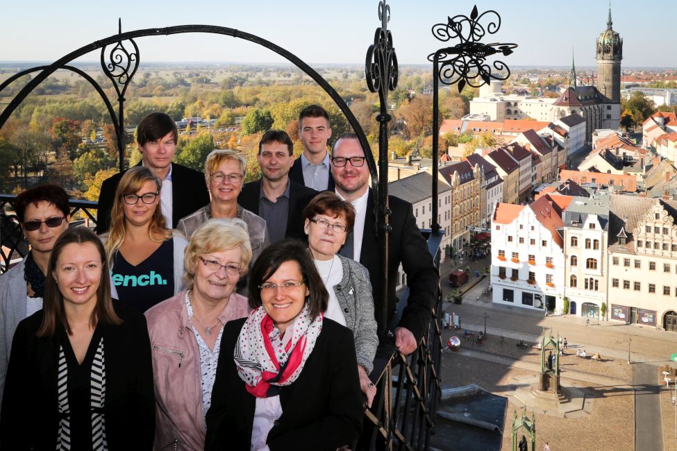 Das Team von Freund & Partner Wittenberg auf der Stadtkirche